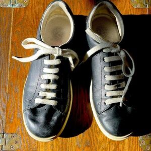 TORY BURCH black leather sneakers.